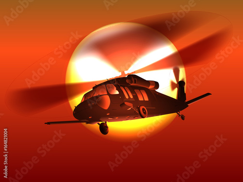 Silhouette helicopter Black hawk helicopter flies over red sunset.