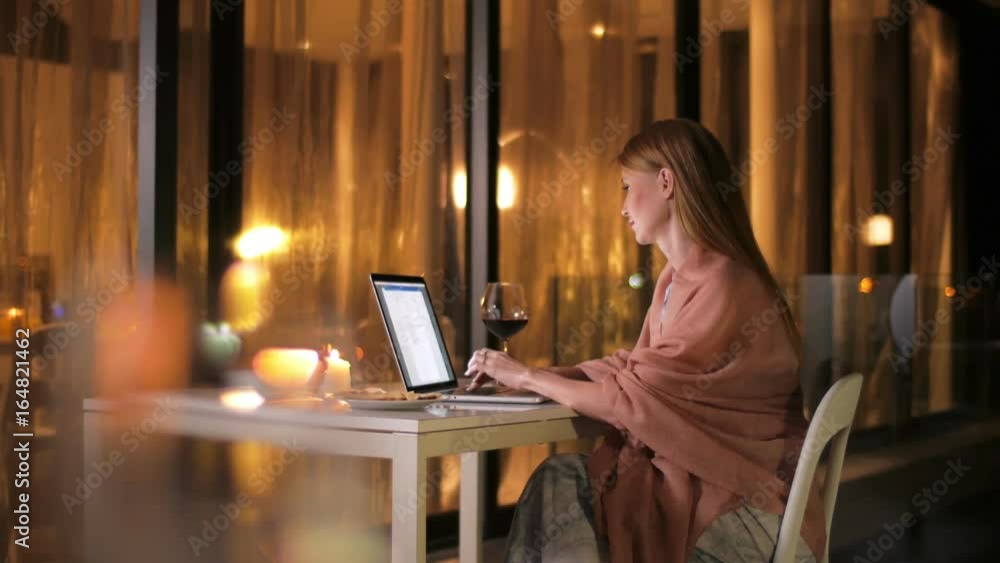 The journalist smokes and writes a new article on the terrace of restaurant The journalist smokes and writes a new article on the terrace of restaurant