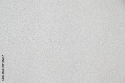 Closeup of white textured wall 
