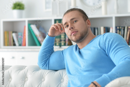 handsome young man on couch