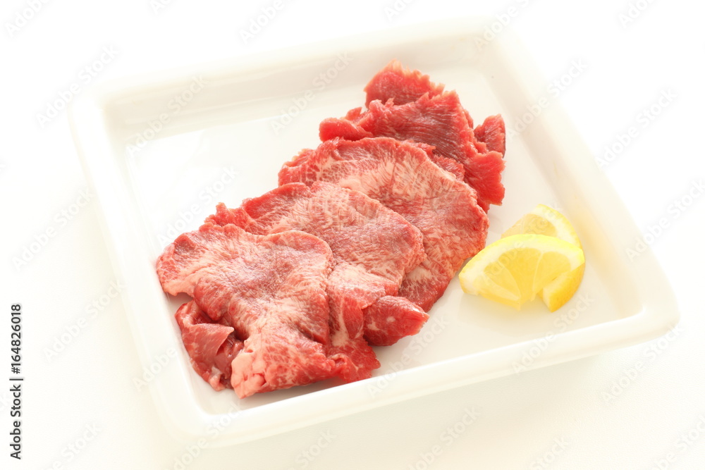 Korean barbecue, beef tongue  sliced on dish