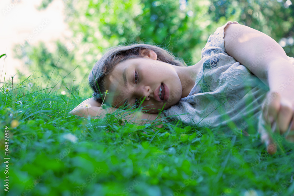 Thoughtful girl is in the field Thoughtful girl is in the field
