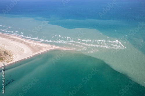 Fototapeta Naklejka Na Ścianę i Meble -  Aerial view of Greenen Denmark,where the to seas meet (Baltic sea and North sea)Greenen is the northern most top of Denmark,and here the lands end.