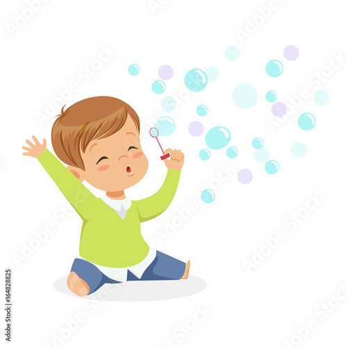 Cute little boy sitting on the floor and playing bubbles vector Illustration
