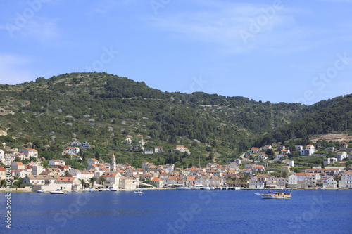 Fototapeta Naklejka Na Ścianę i Meble -  Small town with stone houses by the sea, Photo of town by the sea in summer