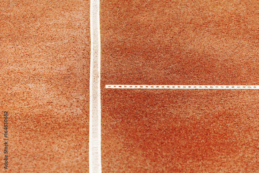 White lines on a clay tennis courts