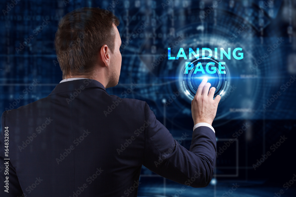 Business, Technology, Internet and network concept. Young businessman working on a virtual screen of the future and sees the inscription: Landing page Business, Technology, Internet and network concept. Young businessman working on a virtual screen of the future and sees the inscription: Landing page