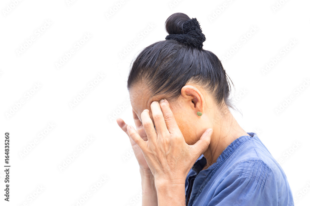 Senior woman had bad headache and sweating on forehead isolated Senior woman had bad headache and sweating on forehead isolated