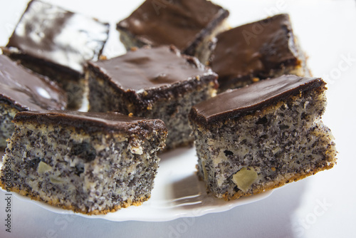Fotografie Chocolate cake with poppy seeds and apple