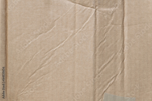 close-up brown cardboard with sticky tape texture background