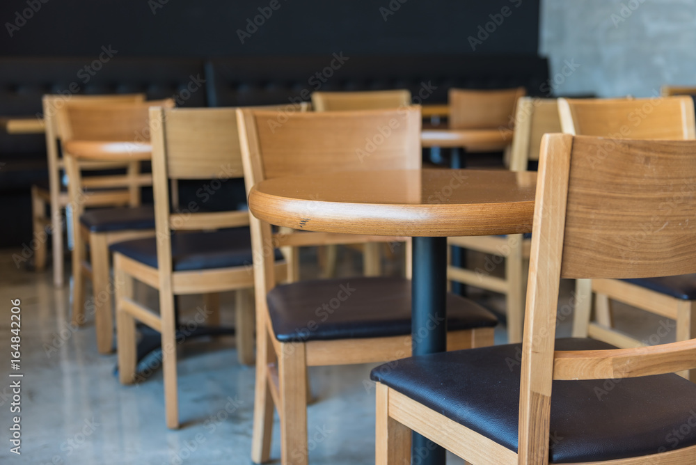 set of wooden round table and chair