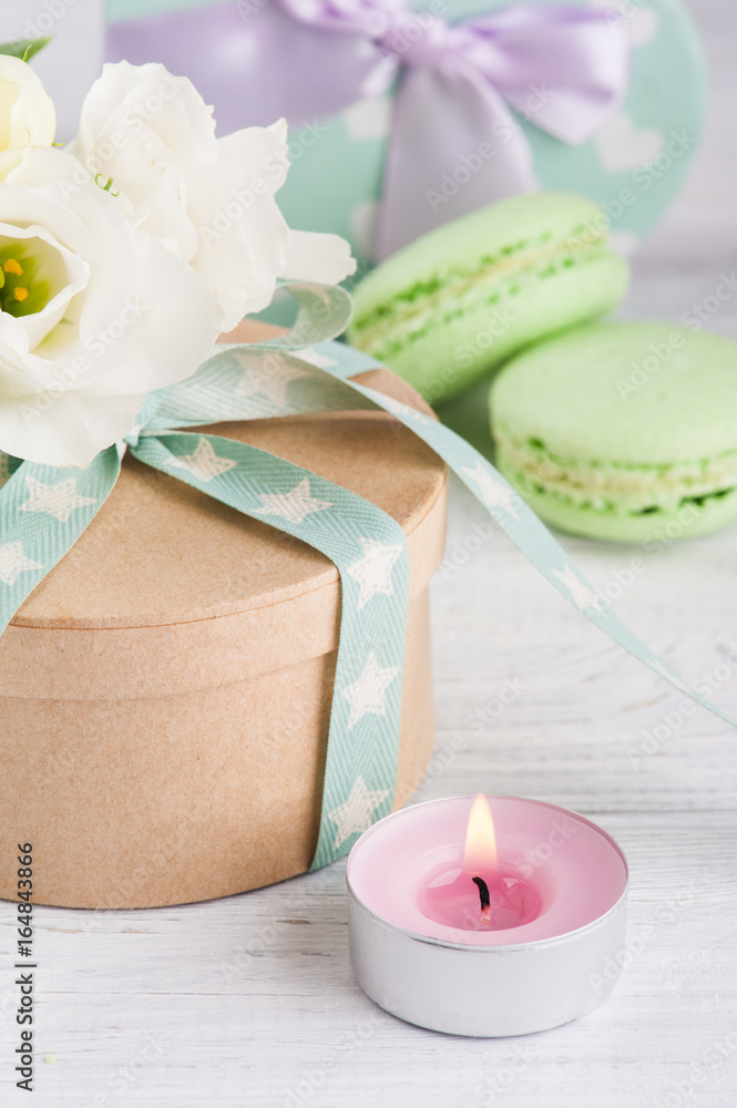 Gift box and bow and macaroons