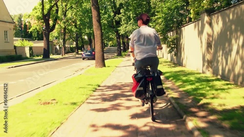 Wallpaper Mural Time lapse of people cycling along urban bike path Torontodigital.ca