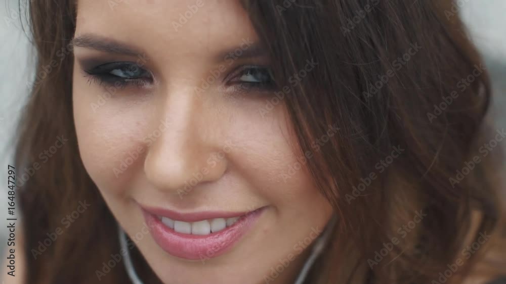 Sensual portrait of a close-up of a beautiful girl with blue eyes Sensual portrait of a close-up of a beautiful girl with blue eyes