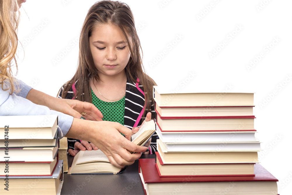 eacher explainig something to her pupil girl eacher explainig something to her pupil girl