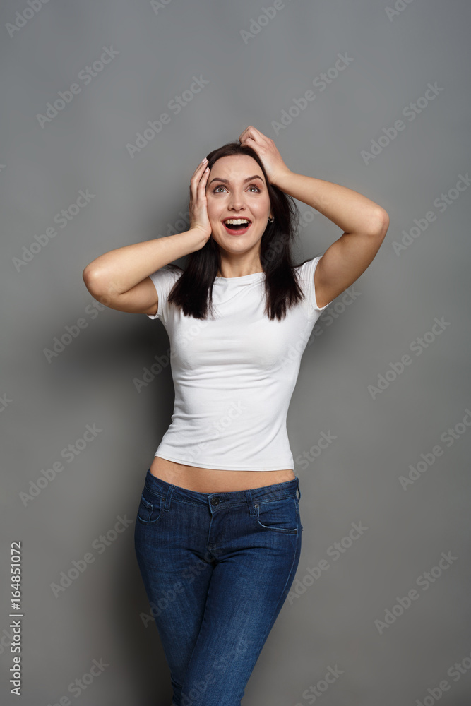 Happy girl posing to camera and shouting Happy girl posing to camera and shouting