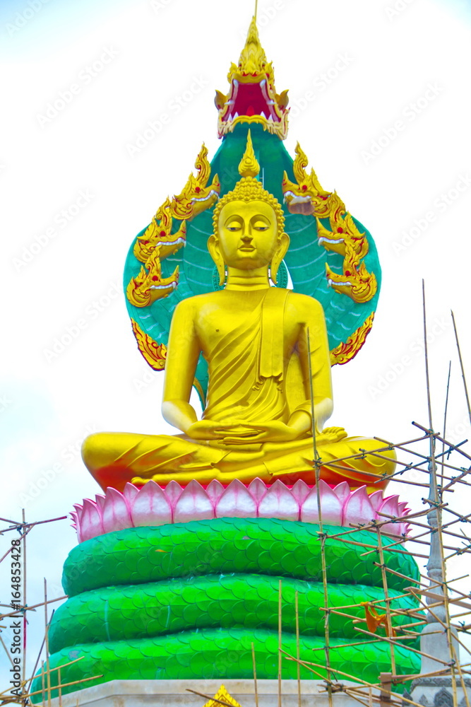 Obraz premium The beautiful lord buddha with king of naga (Pra jao yai sam phob) at Wat Mongkolgowitharam (Wat Huai Wang Nong),Ubonratchathani,Thailand.