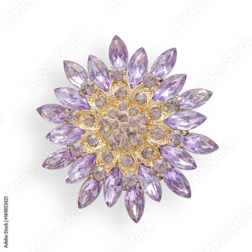 Bild auf Leinwand Round purple brooch with diamonds isolated on white