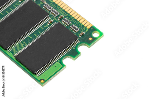 Electronic part of computer which have green board and black chips on white background