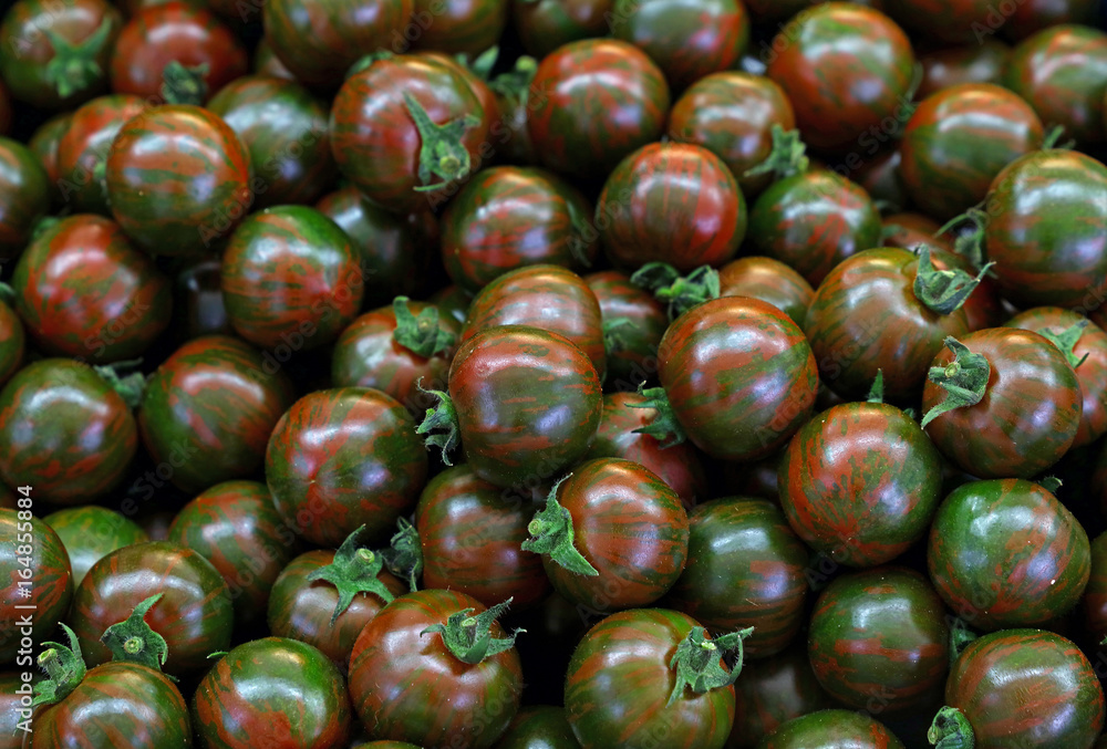 Green Kumato cherry tomatoes background pattern Green Kumato cherry tomatoes background pattern