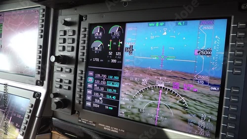 Private airplane cockpit - closeup of modern avionics (screen)  photo