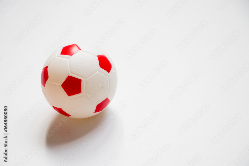 Football child toy placed on white background