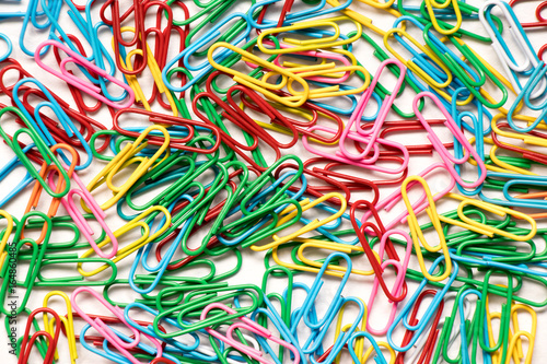 Colorful  Red  green  yellow  pink  blue  paper clip on white background