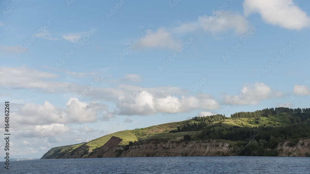 Green meadow on coast - summer landscape Green meadow on coast - summer landscape