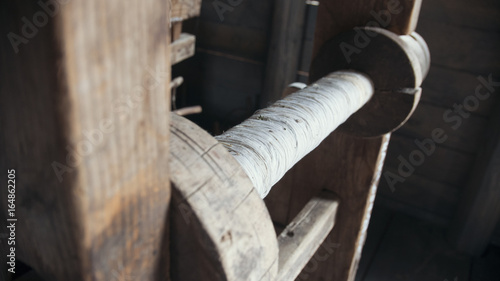 Fototapeta Naklejka Na Ścianę i Meble -  Detail of vintage wooden loom - historical reconstruction