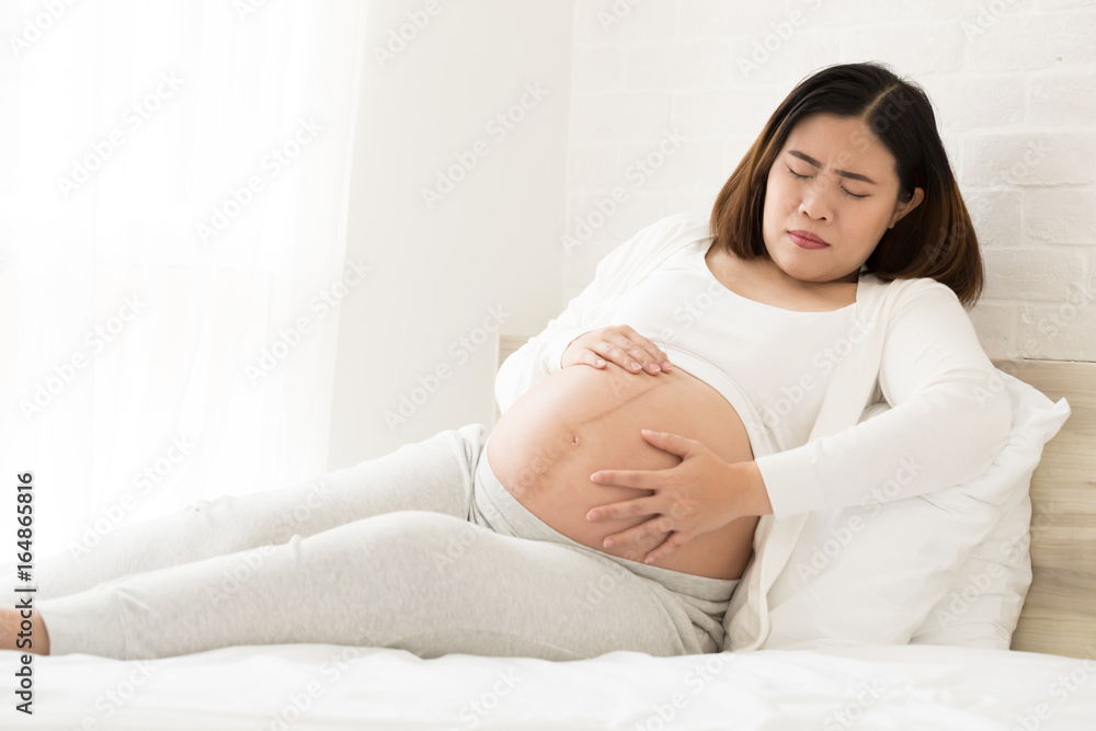 Hard belly and abdominal tightening during pregnancy at 36 weeks pregnant with constant hard stomach and feels like a sharp pain in abdomen. Hard belly and abdominal tightening during pregnancy at 36 weeks pregnant with constant hard stomach and feels like a sharp pain in abdomen.