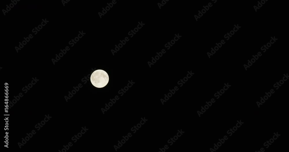 Timelapse, full moon moves across sky Timelapse, full moon moves across sky