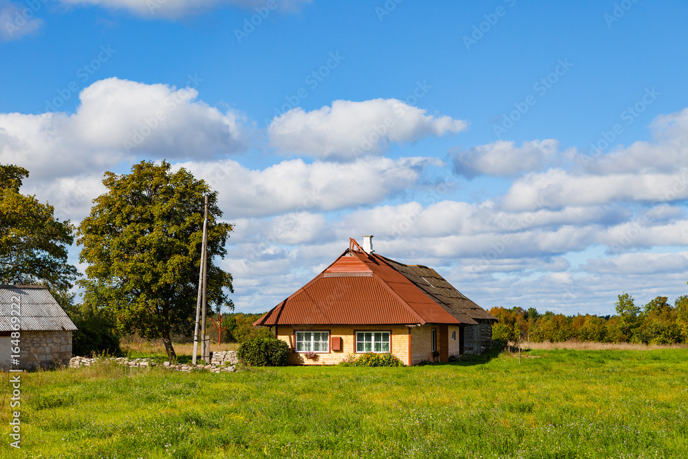 Traditional Northern Europe wooden house. Countryside view.