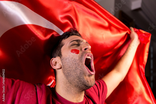 Canvas Print Turkish Guy Celebrating with Turkey Flag