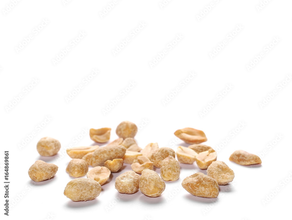 Pile salted fried peanut isolated on white Pile salted fried peanut isolated on white