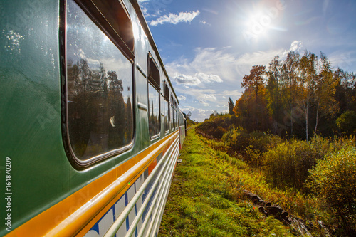 ALUKSNE, LATVIA - OCTOBER 15, 2016: Old steam train is a local attraction photo