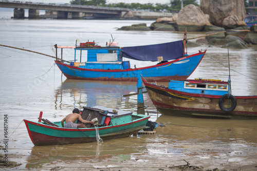 Tourist Junks and Floating village in Halong Bay 