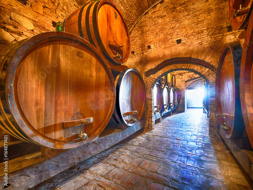 Canvas Print Winery cellar with special edition wine aging in barrels for a few years until i