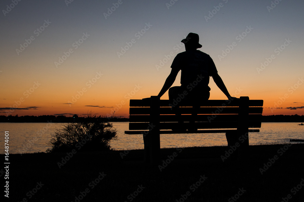 Man Sitting On Bench Silhouette