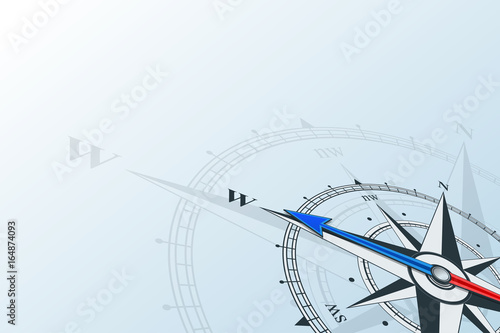 Compass west. Compass with wind rose, the arrow points to the west. Compass on a blue background. Compass illustrations can be used as background. Flat background with copy space place. Travel concept