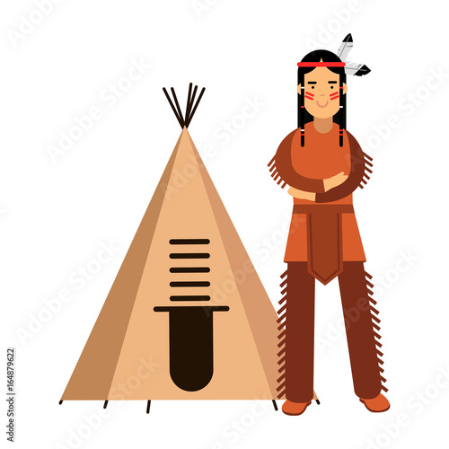 Canvas Print Native american indian in traditional costume standing near his wigwam or teepee