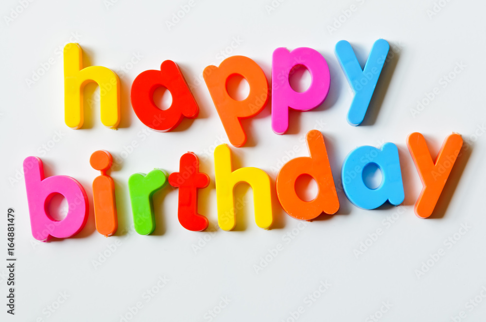 Naklejka premium Fridge magnets magnetic letters spelling out 