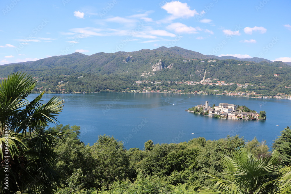 Viewpoint from Sacro Monte d'Orta to Lake Orta and Isola San Giulio in summer, Piedmont Italy 