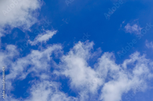 White clouds in deep blue sky