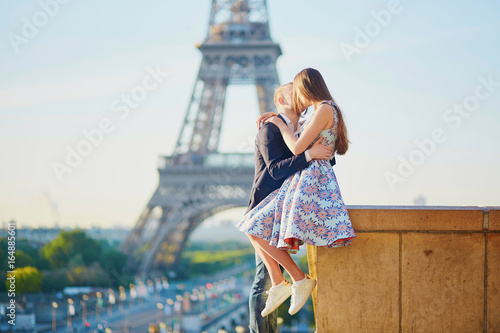 Romantic couple near the Eiffel tower in Paris