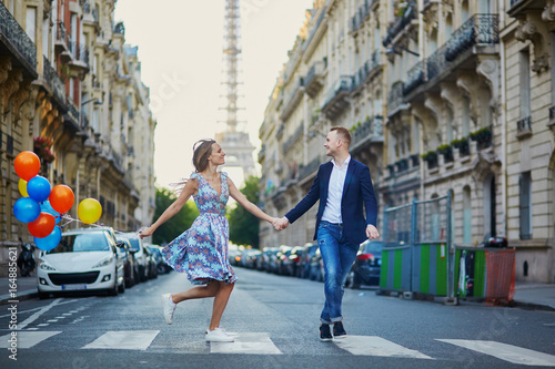 Romantic couple near the Eiffel tower in Paris