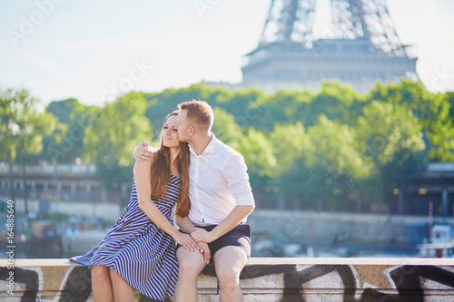 Romantic couple near the Eiffel tower in Paris © Ekaterina Pokrovsky