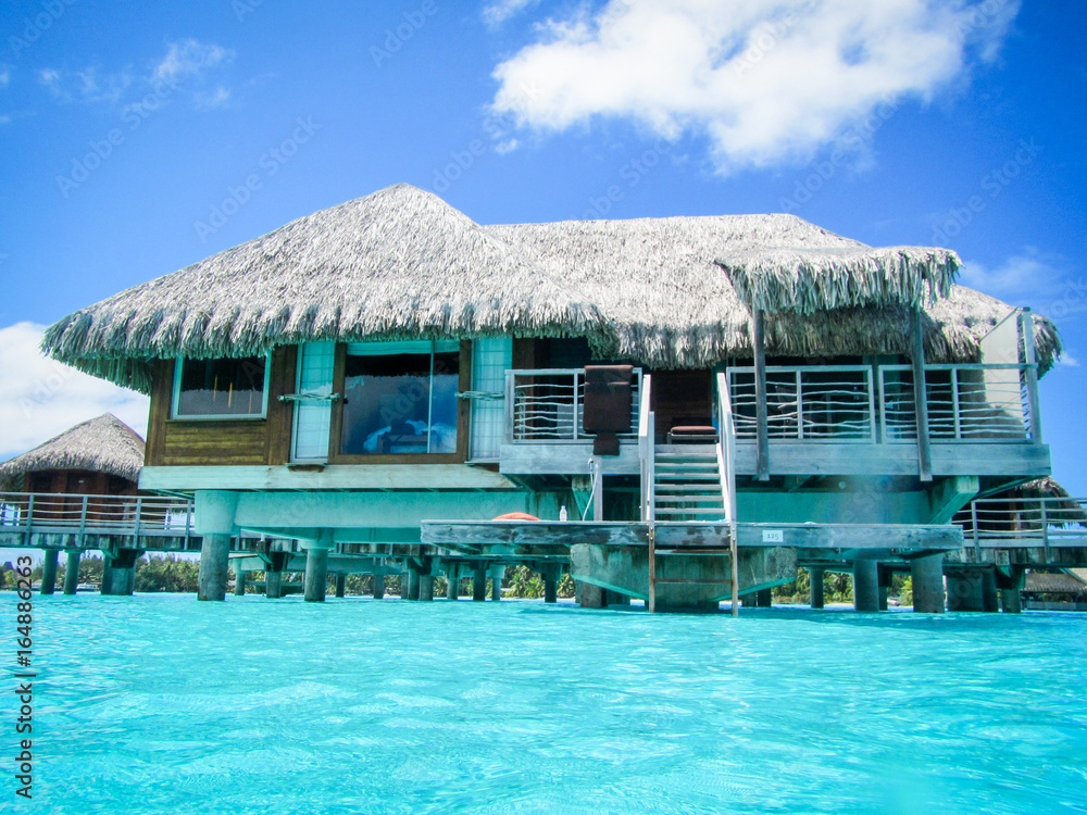 A view of your new water stilt hut in Bora Bora, a beautiful island part of the French Polynesia A view of your new water stilt hut in Bora Bora, a beautiful island part of the French Polynesia