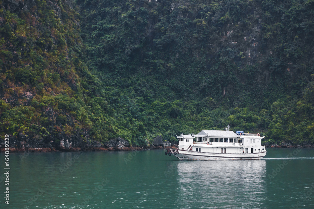 Cruise ship on the water of Halong bay in Vietnam.