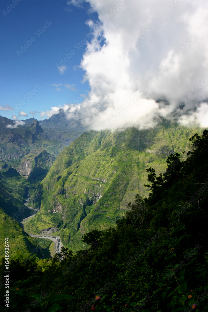 The volcanic tropical hills and valleys of Reunion Island, off the coast of Africa