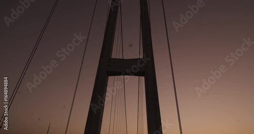 Low angle POV, driving on Yi Sun-Sin bridge at sunset